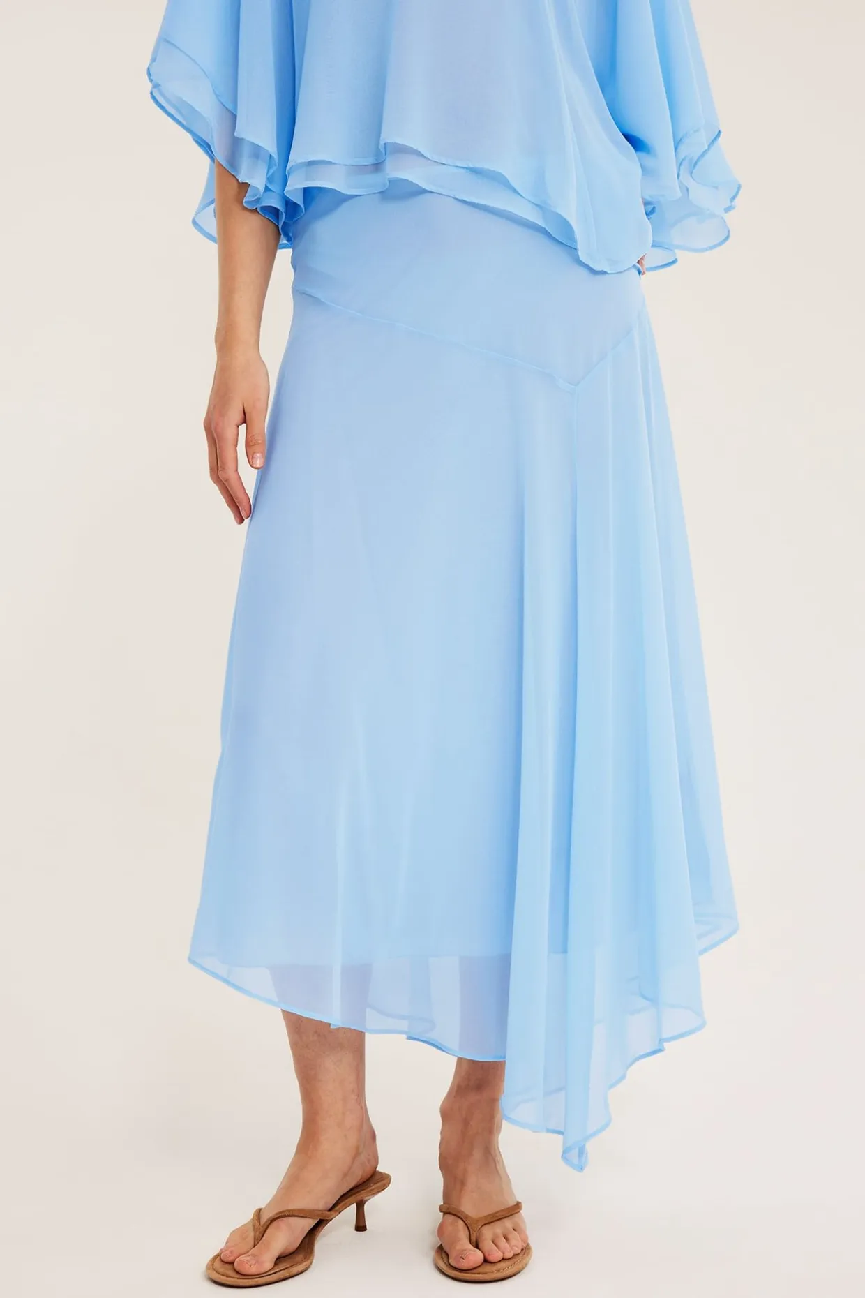 Asymmetrisk kjol i chiffong