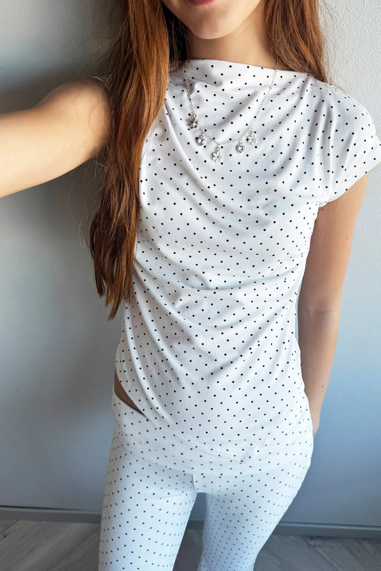 Asymmetrisk topp med prickar