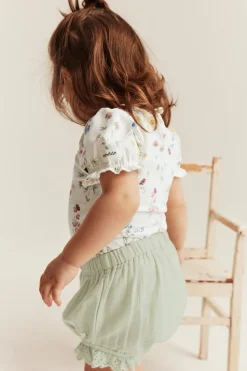 Blommig body med puffärm