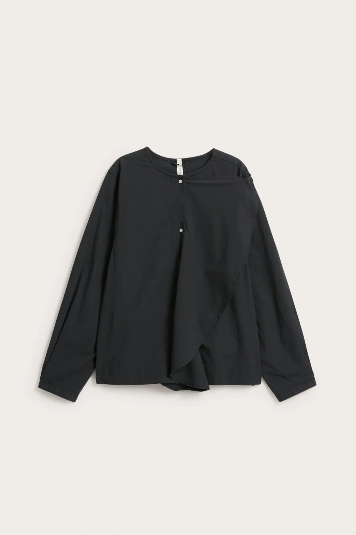 Blus med avtagbar volang