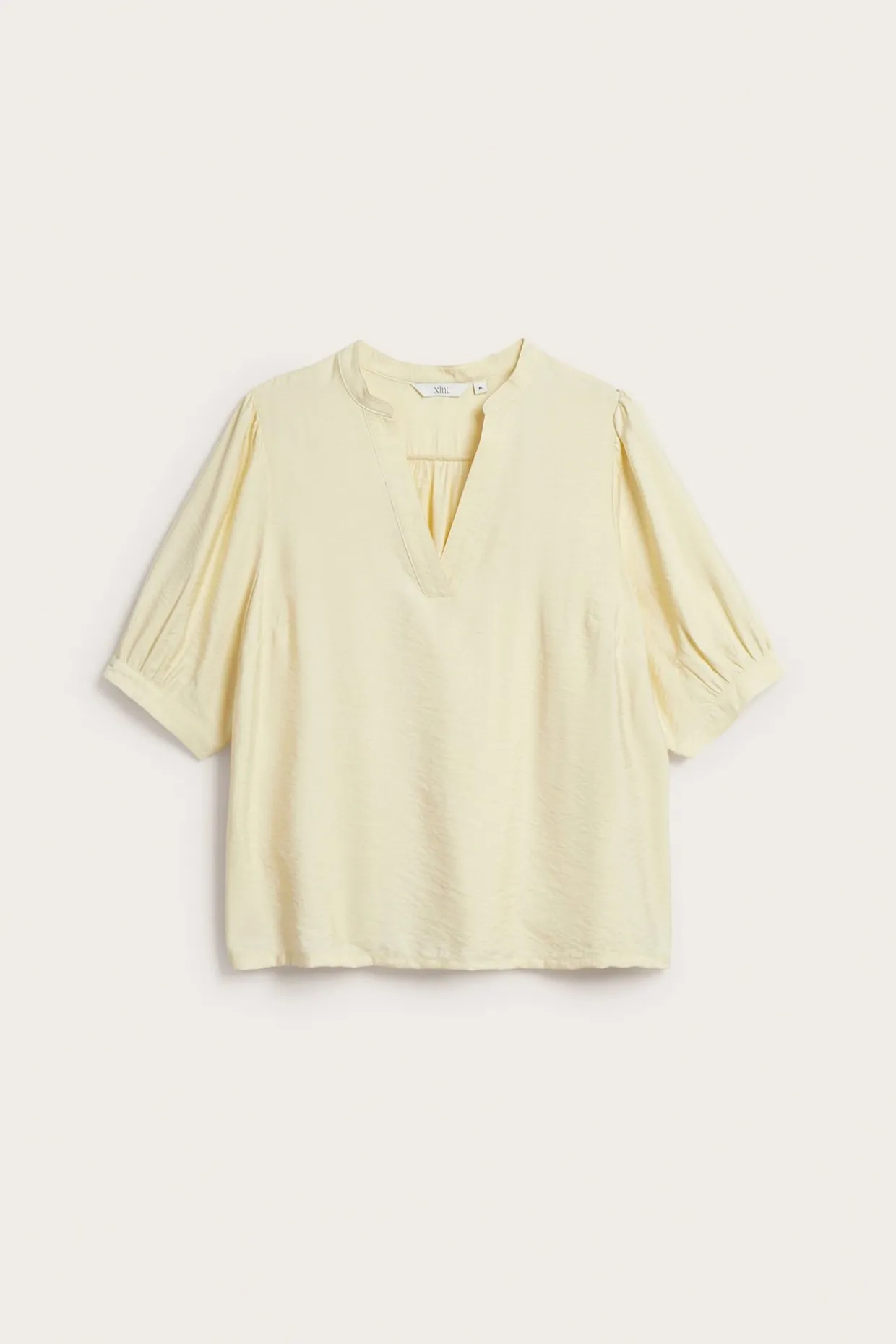 Blus med puffärm