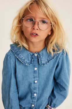 Blus med volangkrage i bomullsdenim