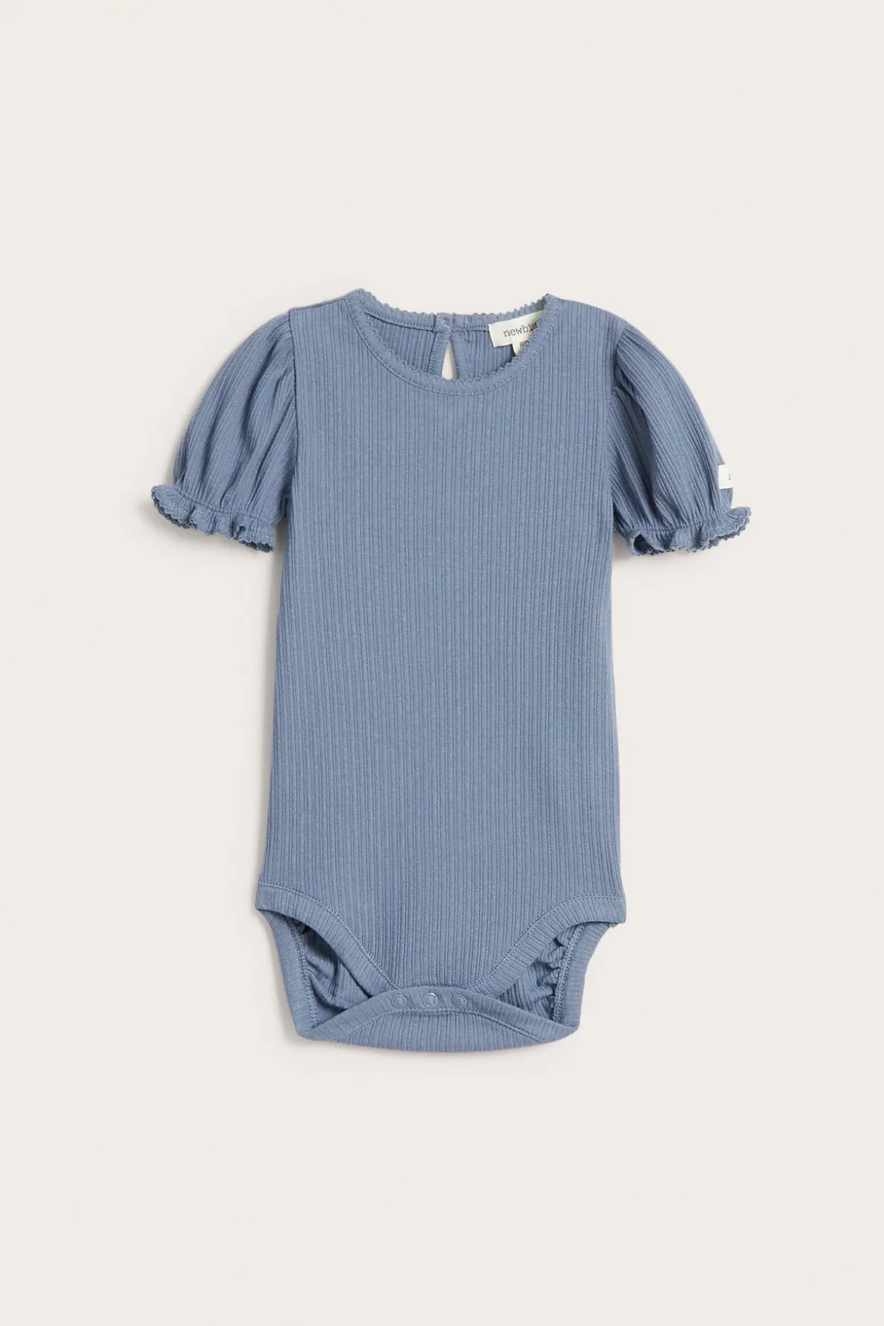 Kortärmad body med puffärm