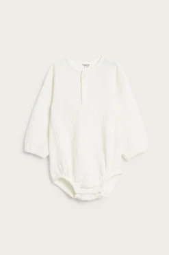 Långärmad body i muslin