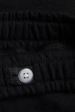 Mjukisshorts med fickor