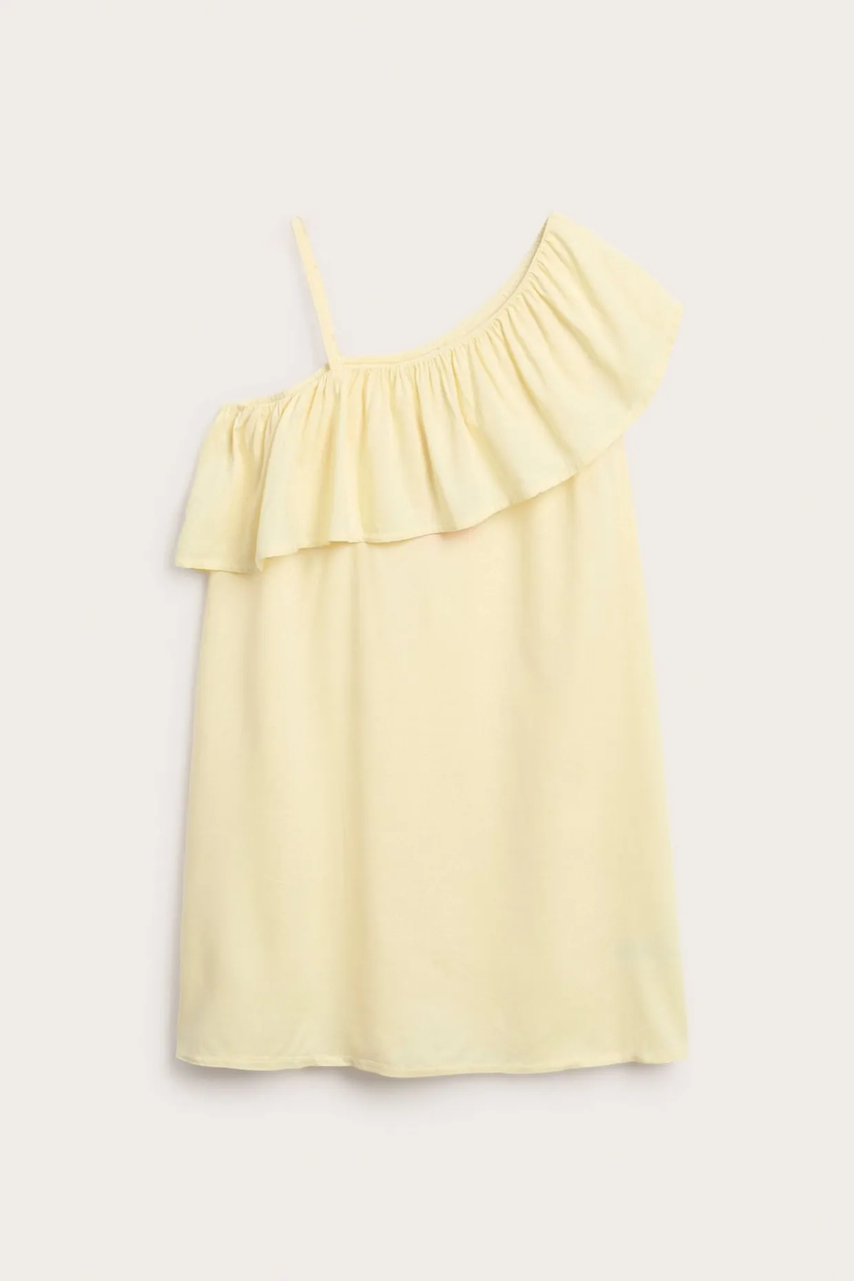 One shoulder klänning med volangkant
