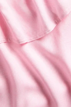 One shoulder klänning med volangkant