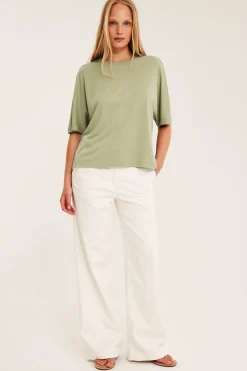 Oversized topp med kort ärm