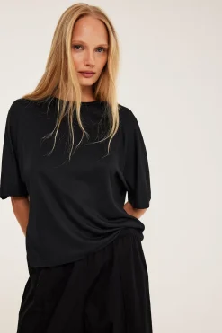 Oversized topp med kort ärm