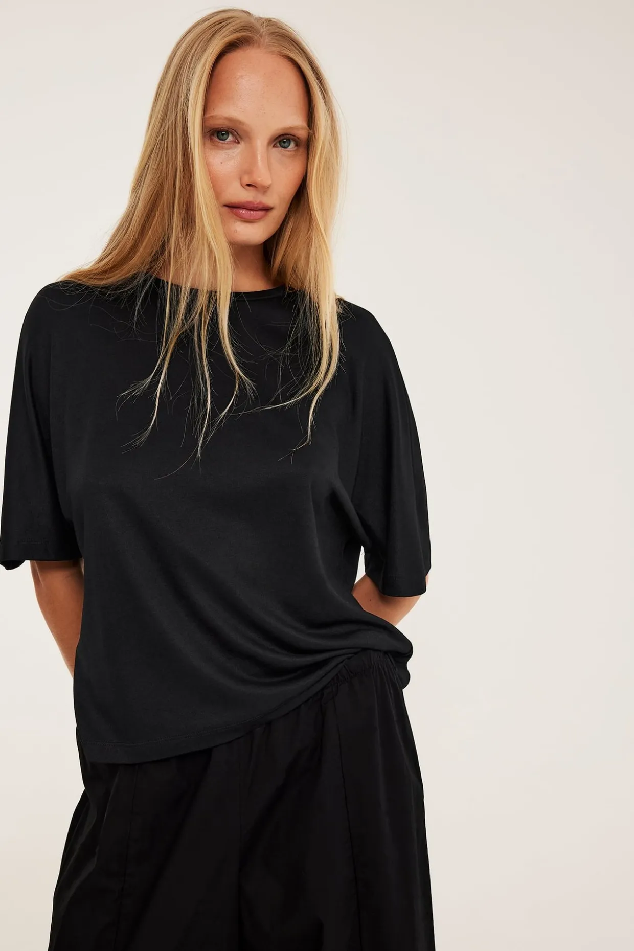 Oversized topp med kort ärm