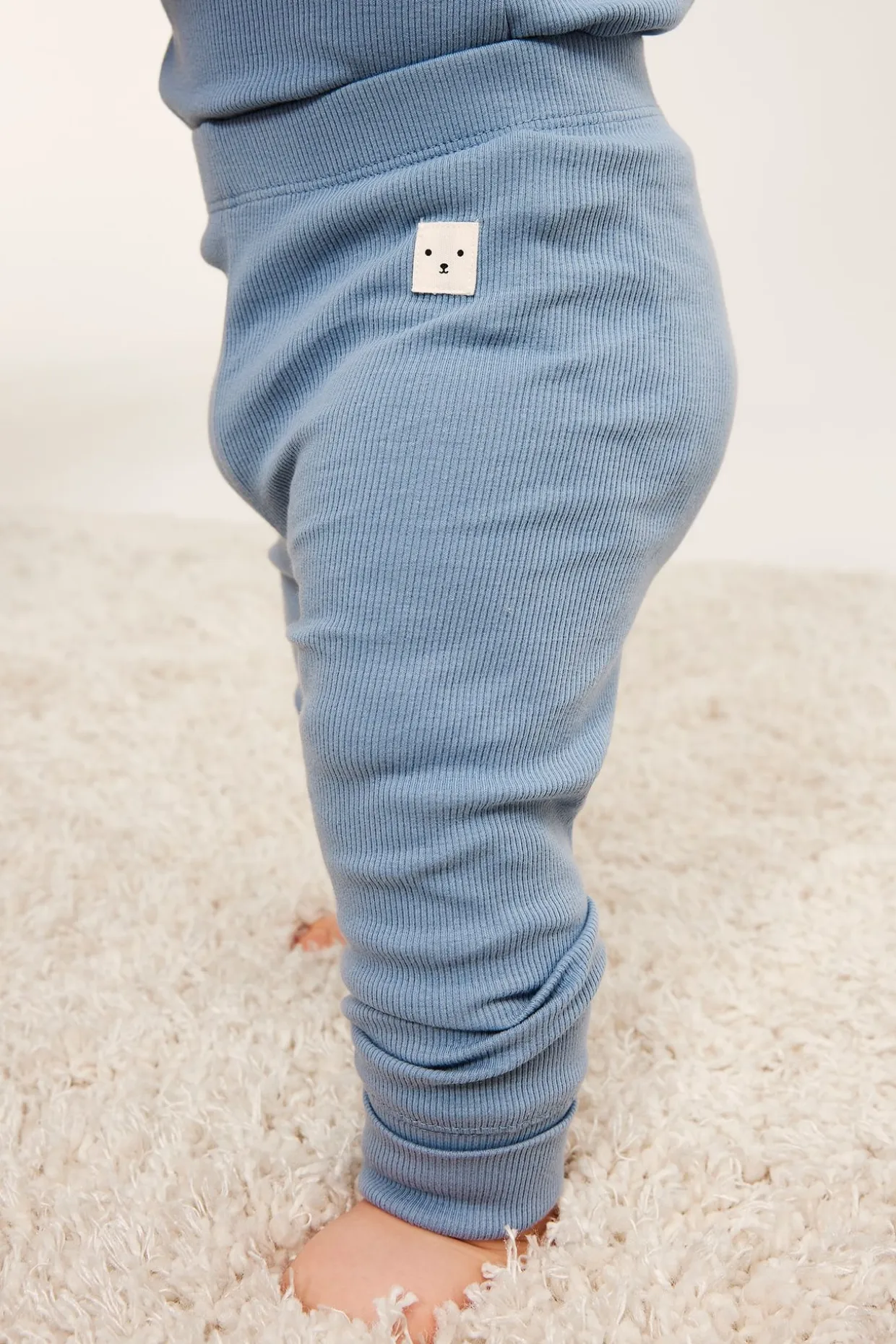 Ribbade leggings med justerbar längd