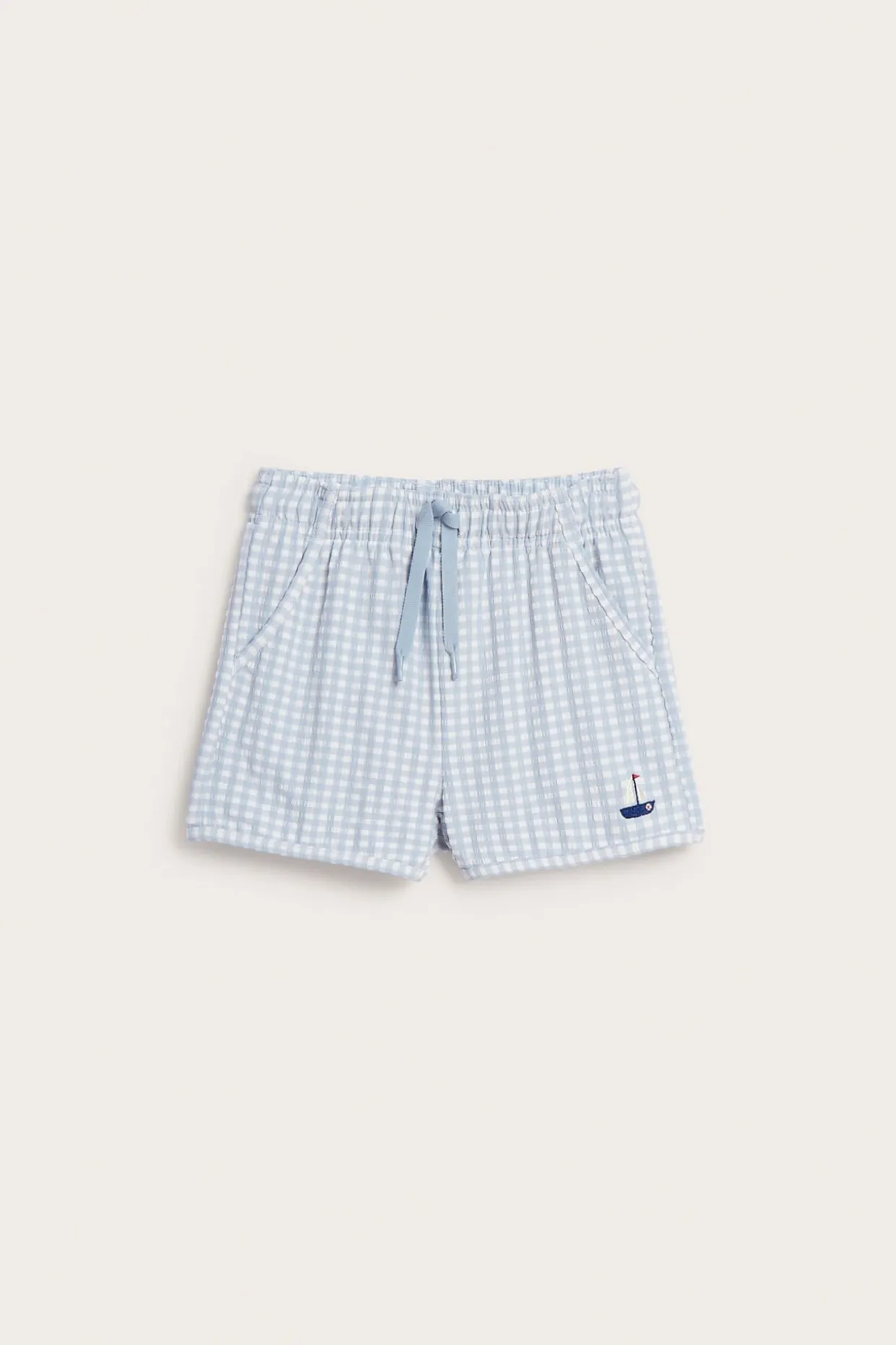 Rutiga badshorts med båt
