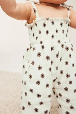 Småblommig jumpsuit med rosetter