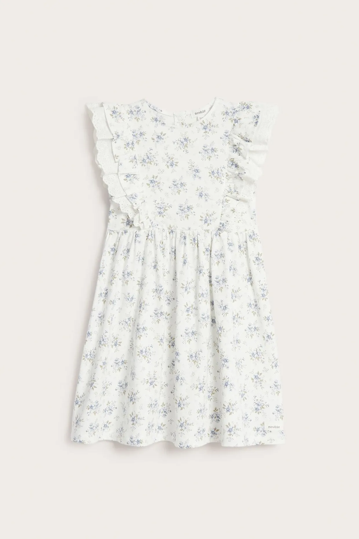 Småblommig klänning med volang