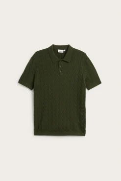 Stickad polotröja med flätmönster
