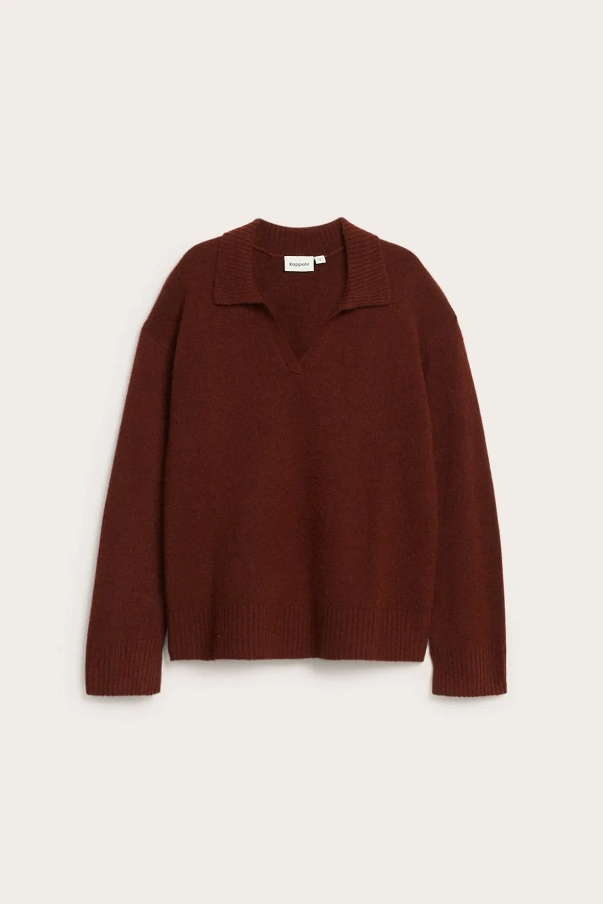 Stickad tröja med krage