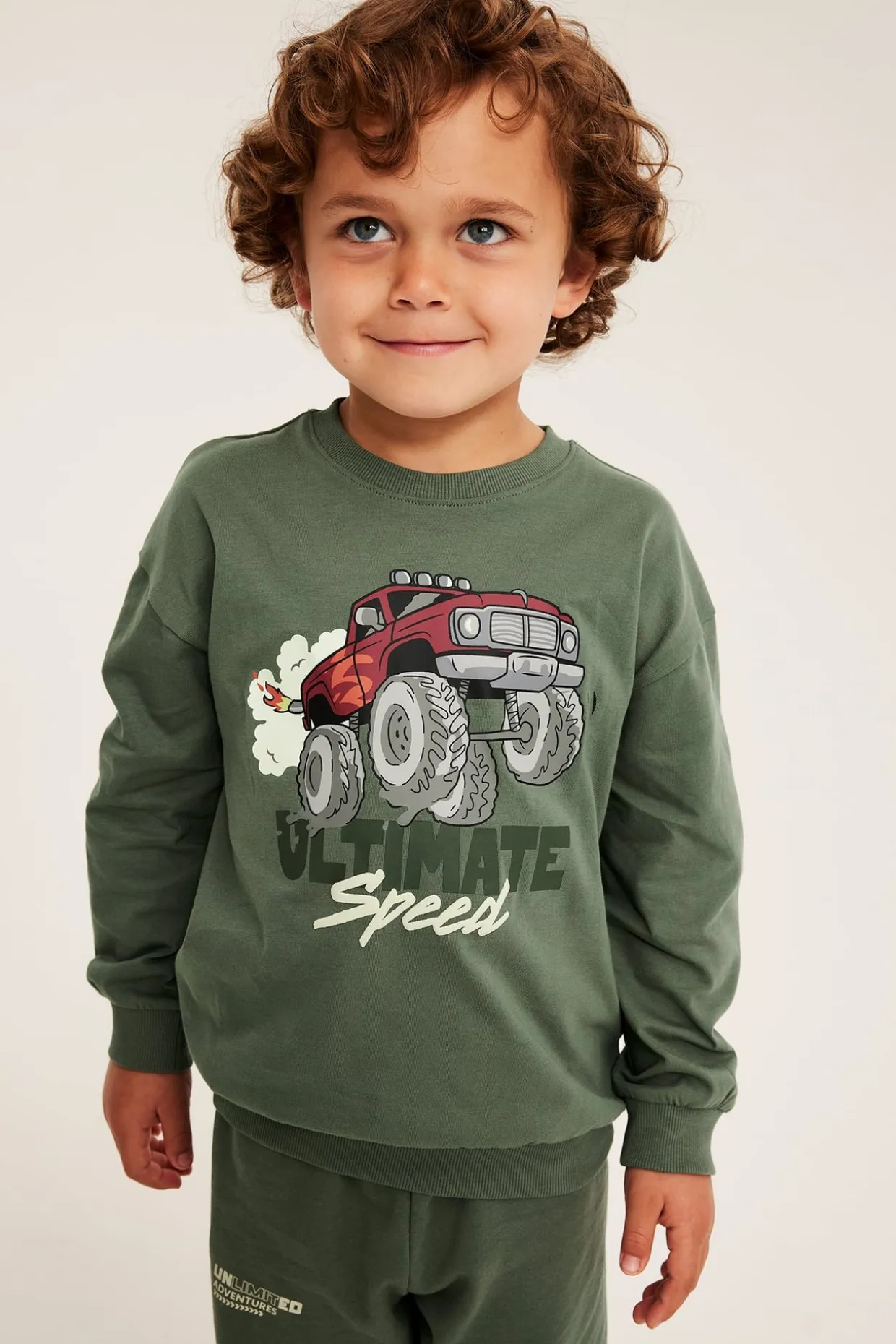 Sweatshirt i bomullstrikå med tryck av monsterbil
