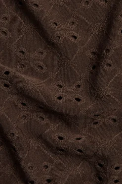 Topp med broderie anglaise