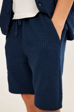 Trikåshorts i bäckebölja