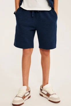Trikåshorts i bäckebölja