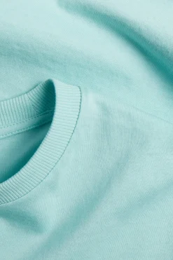 T-shirt i bomullstrikå med kort ärm
