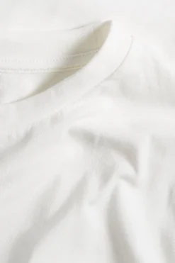 T-shirt i bomullstrikå med kort ärm