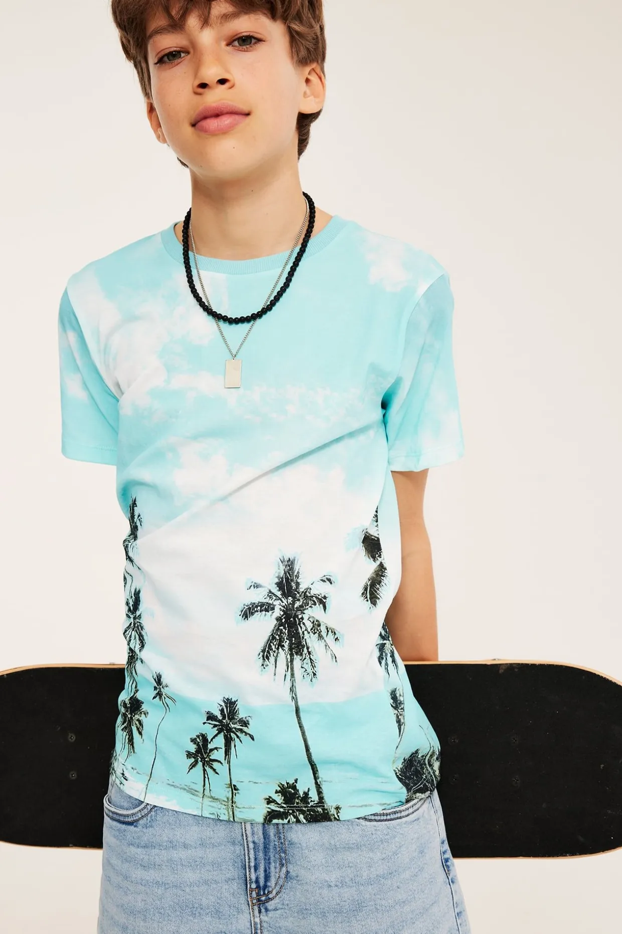 T-shirt i bomullstrikå med palmmotiv