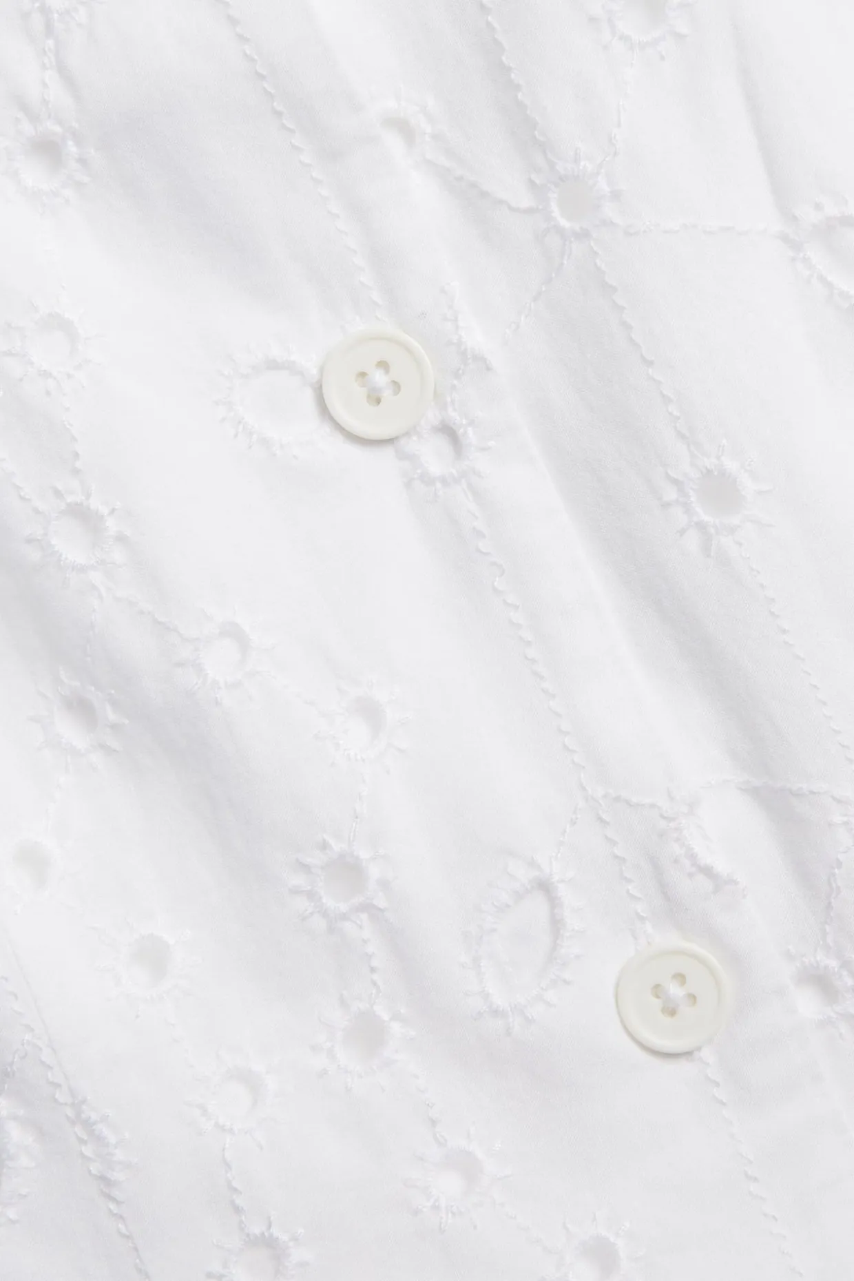 Väst i broderie anglaise