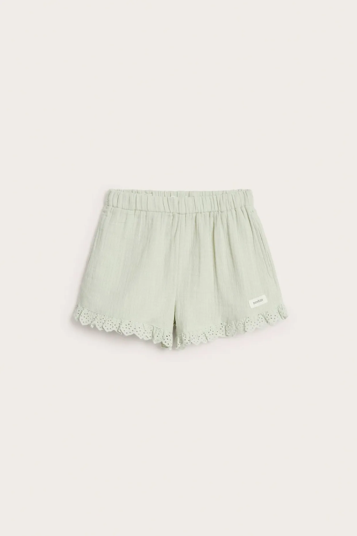Vävda shorts med volang