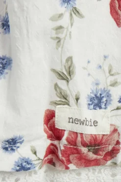 Vävd blommig klänning