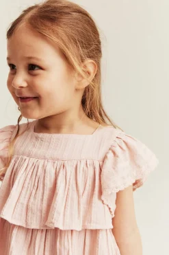 Vävd blus med volanger