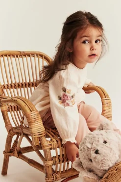 Vävd body med blombroderi